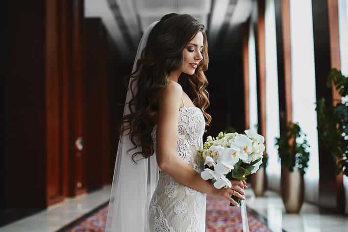 Beautiful bride wearing hair extensions
