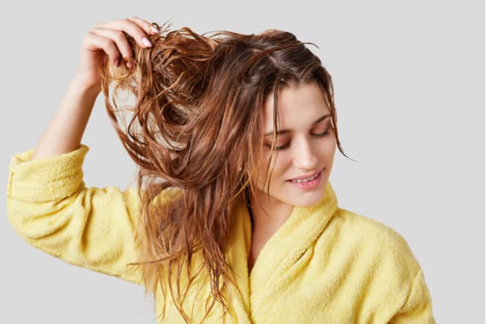 6 Helpful Tips to Repair Your Damaged Hair 3 | Emilly Hadrill: Hair Extensions in Gold Coast, Brisbane, Melbourne & Sydney model with wet hair - image 001